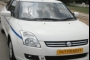 Hire a 4 seater Car with driver (Suzuki Dzire 2011) from Japji Travel in New Dehli 