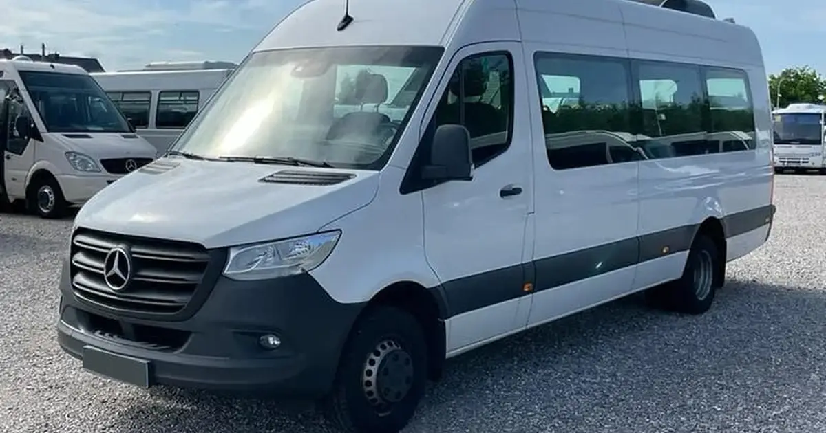 An 18 seater Mercedes Sprinter minibus parked in Salamanca