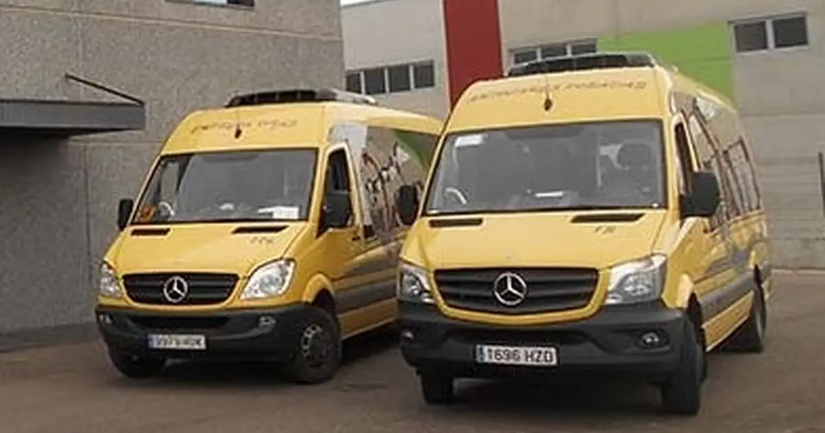 Two 15 seater minibus Mercedes Sprinter parked in Zamora