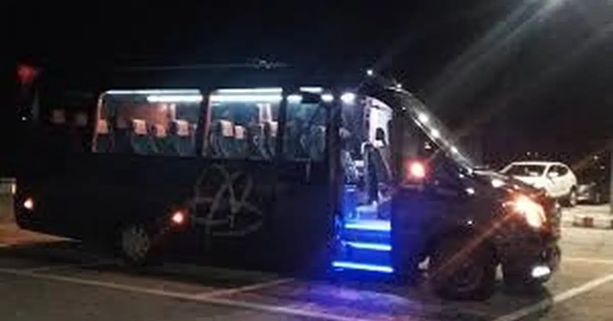 A Mercedes Sprinter minibus with 16 seats at night in Guadalajara