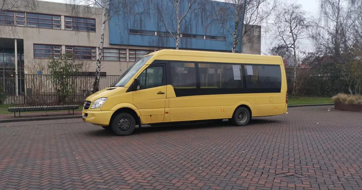 A 16 seater minibus Mercedes Sprinter at a street in Antwerpen