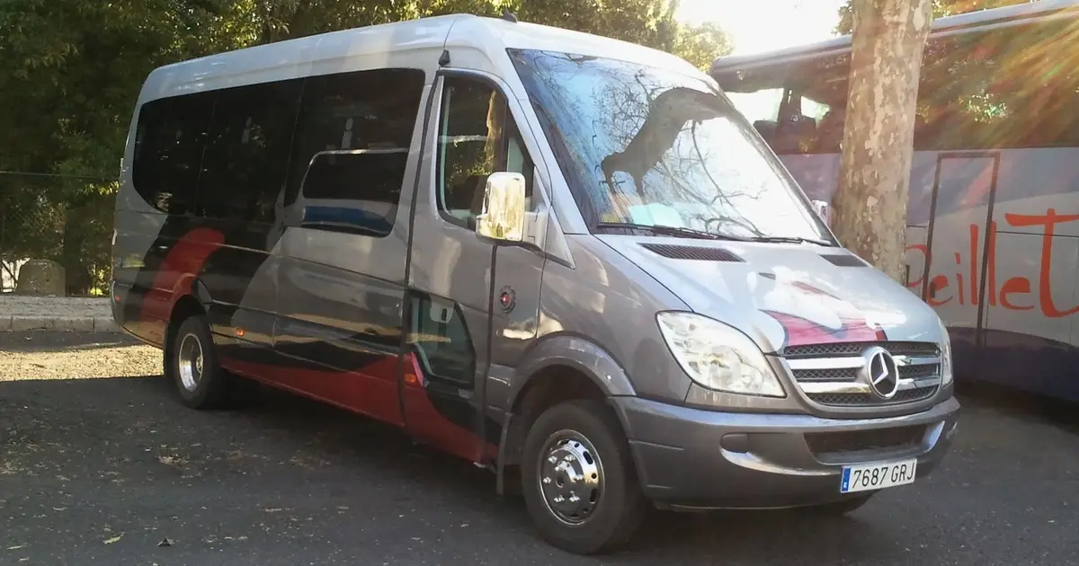 A 16 seater minibus Mercedes Sprinter at a parking in Jaen